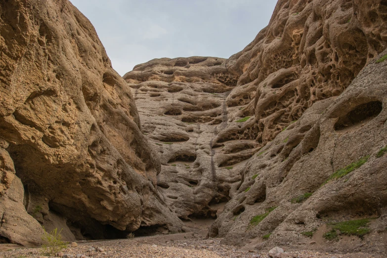 a close up of a mountain with a steep trail