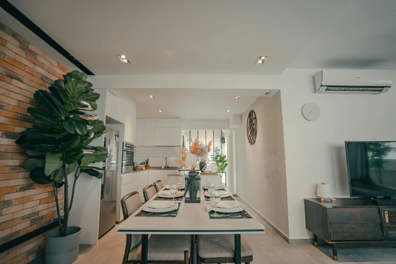 long wooden table in the middle of a dining room