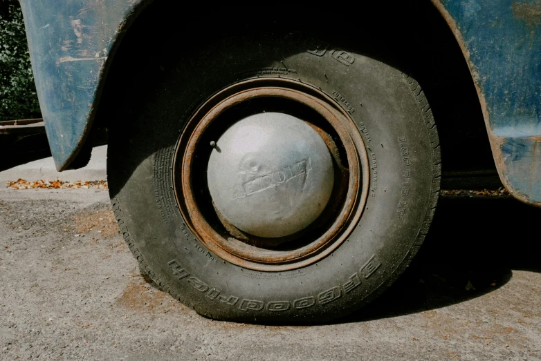 tire that has been turned off sitting on cement