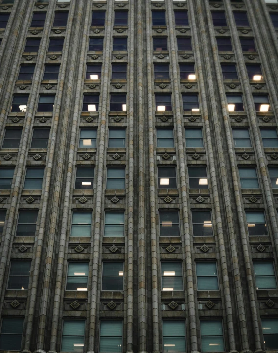 an intricately detailed building is shown with small windows