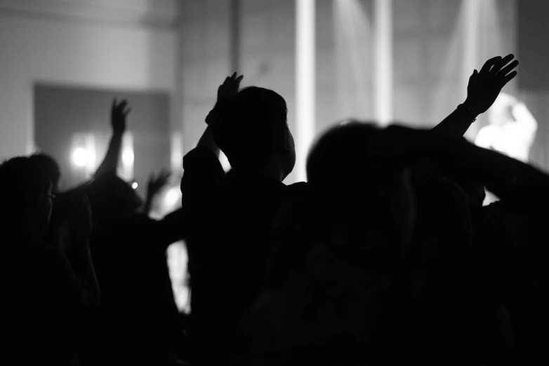 black and white pograph of people at a concert