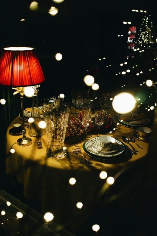 some lights shining down on a table