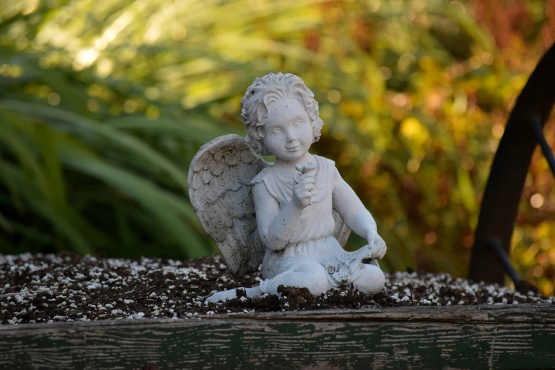 there is a small statue sitting on a table