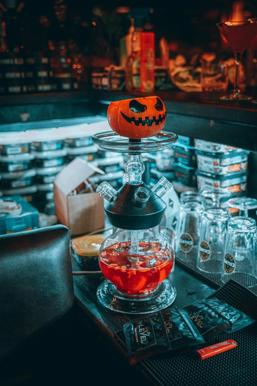 a pumpkin in a bowl on top of a glass shelf