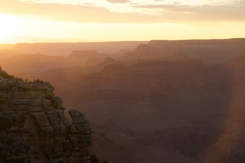 the sun sets over an arid area that is very large