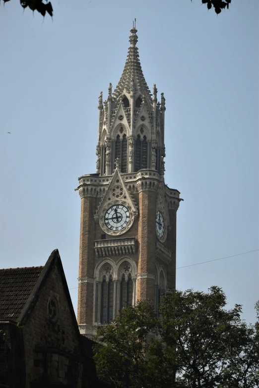 a large building that has a clock on the front