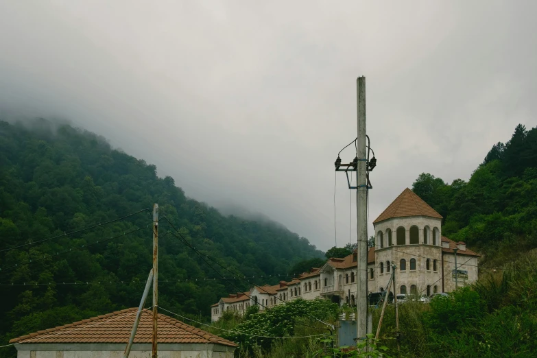 the old church building is surrounded by the trees