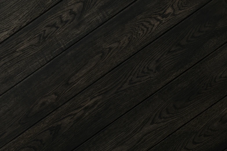 a brown and black wooden table that has black wood grain