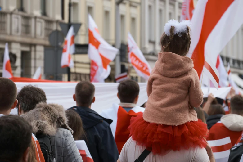 a group of people in costume on a street