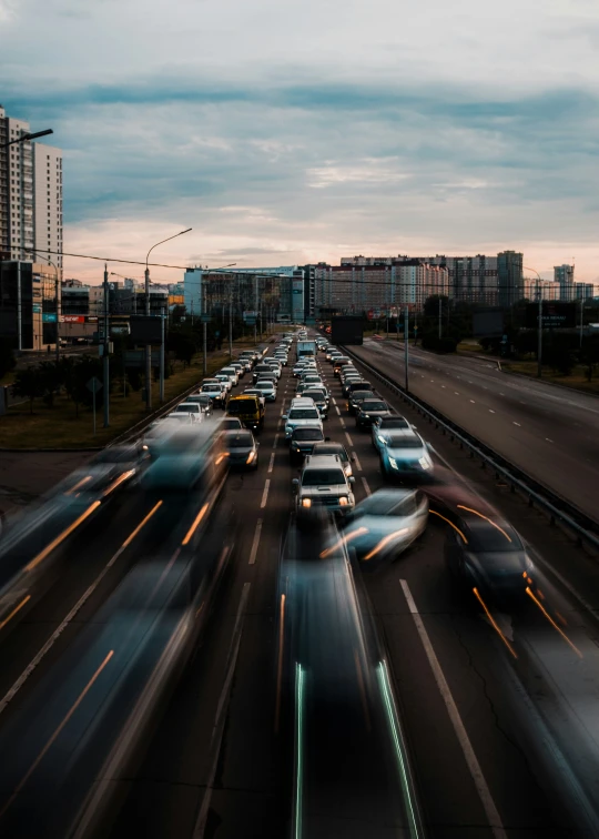 a bunch of traffic on the freeway in the evening