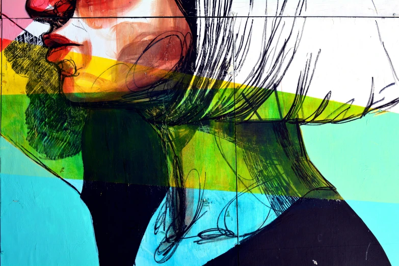 a woman's face is featured over a multi - colored geometric background