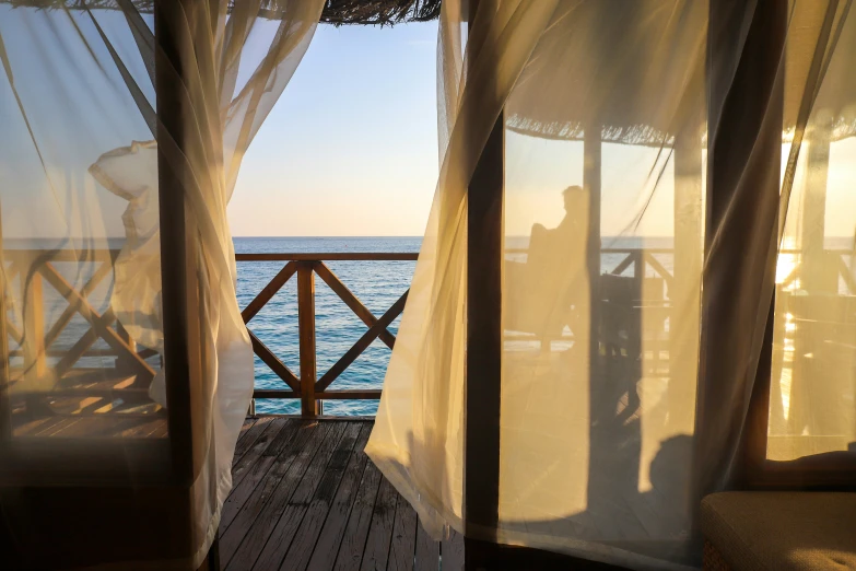 the view from inside an open door into the sea