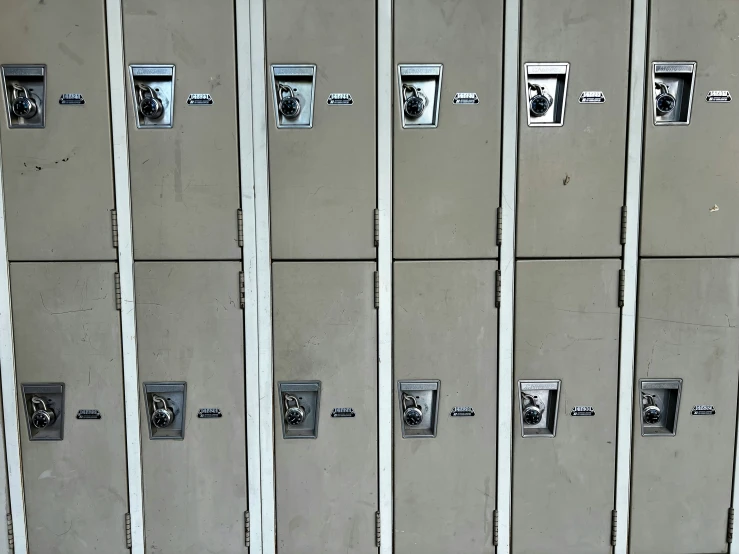 a locker with several small door s and three doors