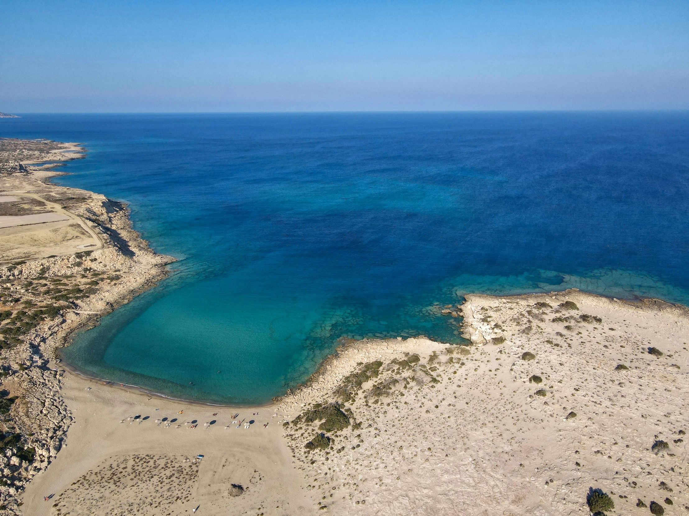 the ocean and beach are shown from above