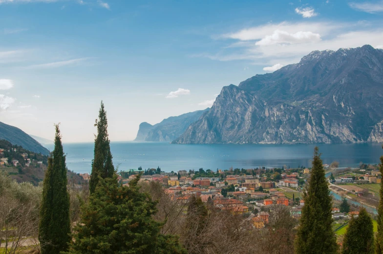 a scenic view of a city and the mountain side