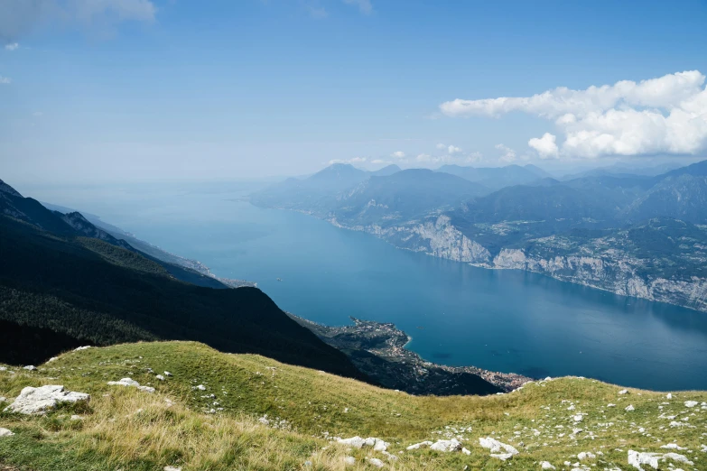 a view of the ocean and mountains from above