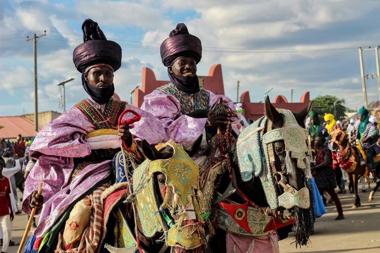 two people are sitting on their own horses