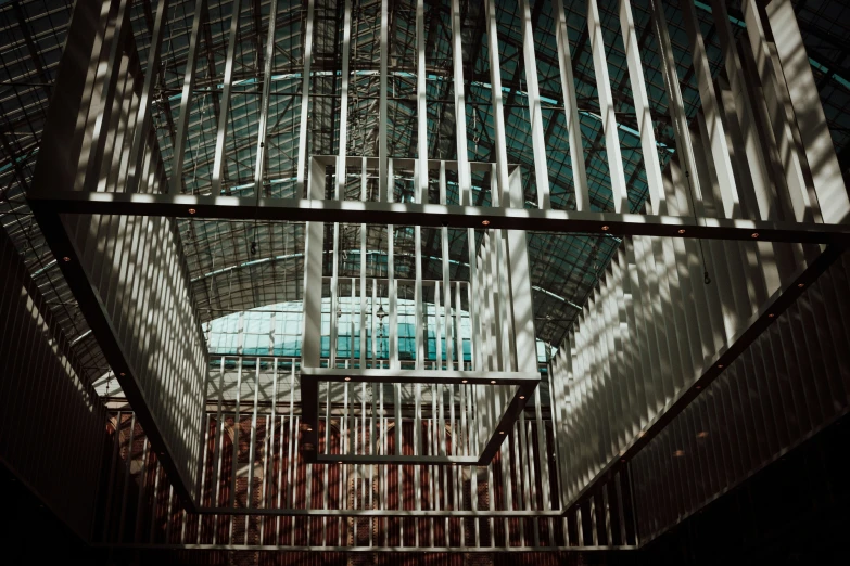 an architectural view of a building through the bars