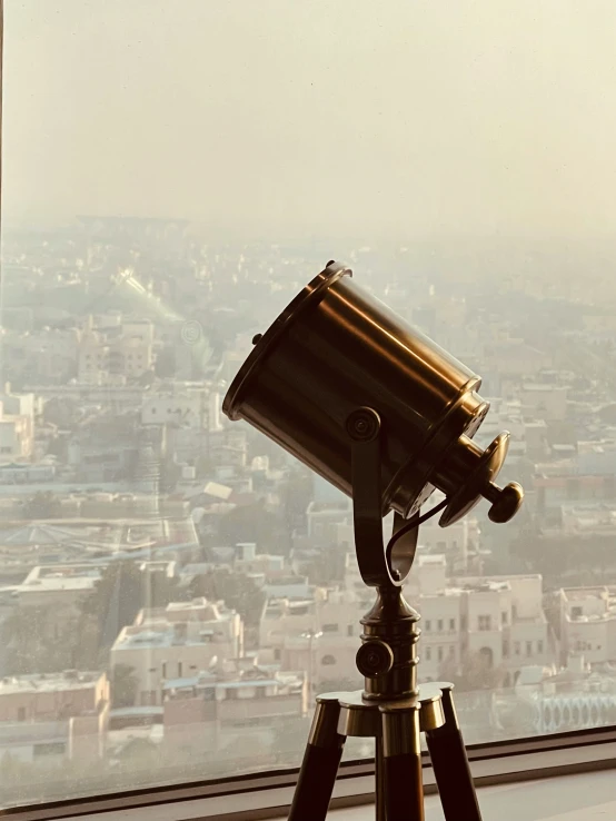 a telescope and some other telescopes on a stand