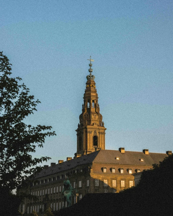 a clock on the top of a large building