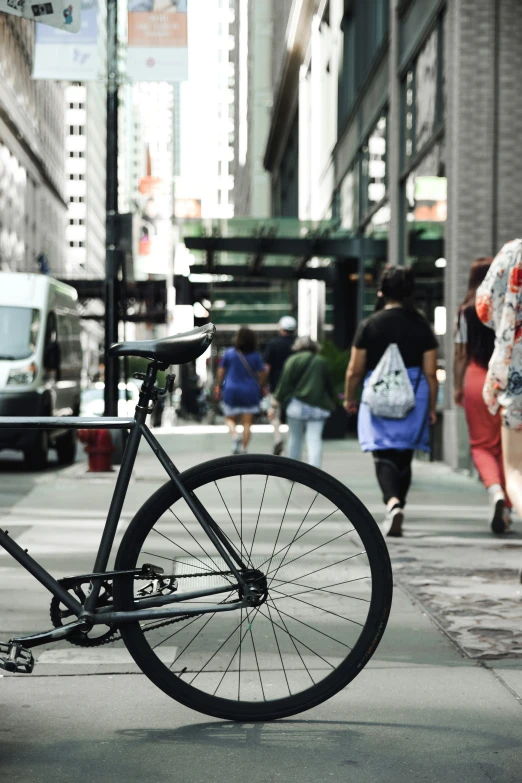 a bike is parked on the side walk