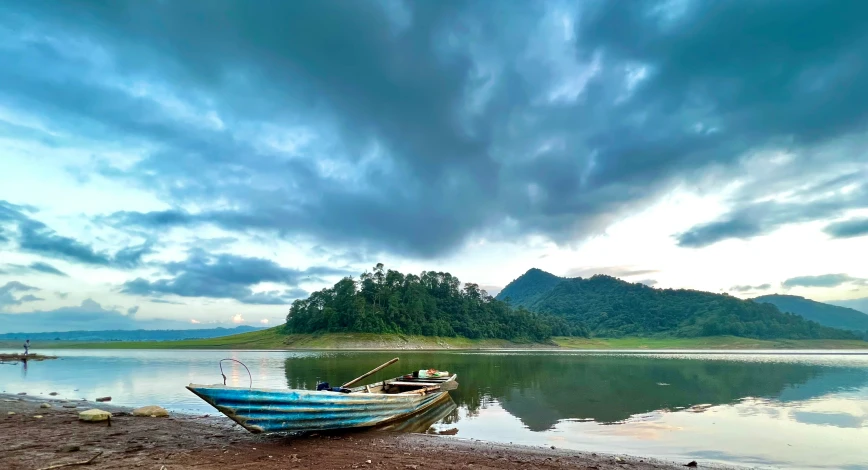 a row boat in the middle of the water