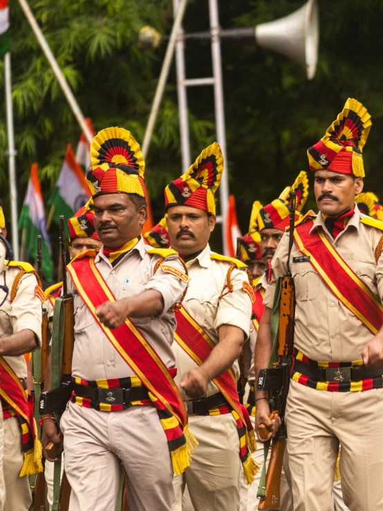 some indian soldiers marching in the street