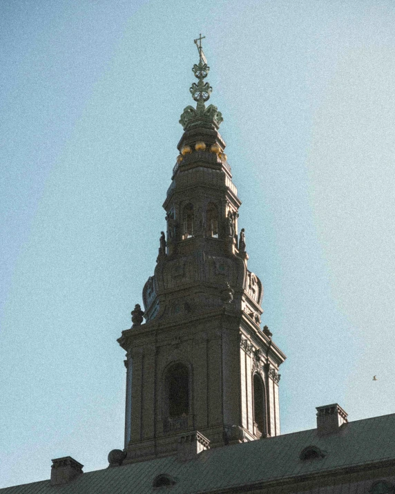 a clock is on the top of a building