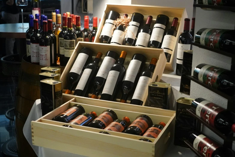 a wooden box filled with lots of bottles of wine