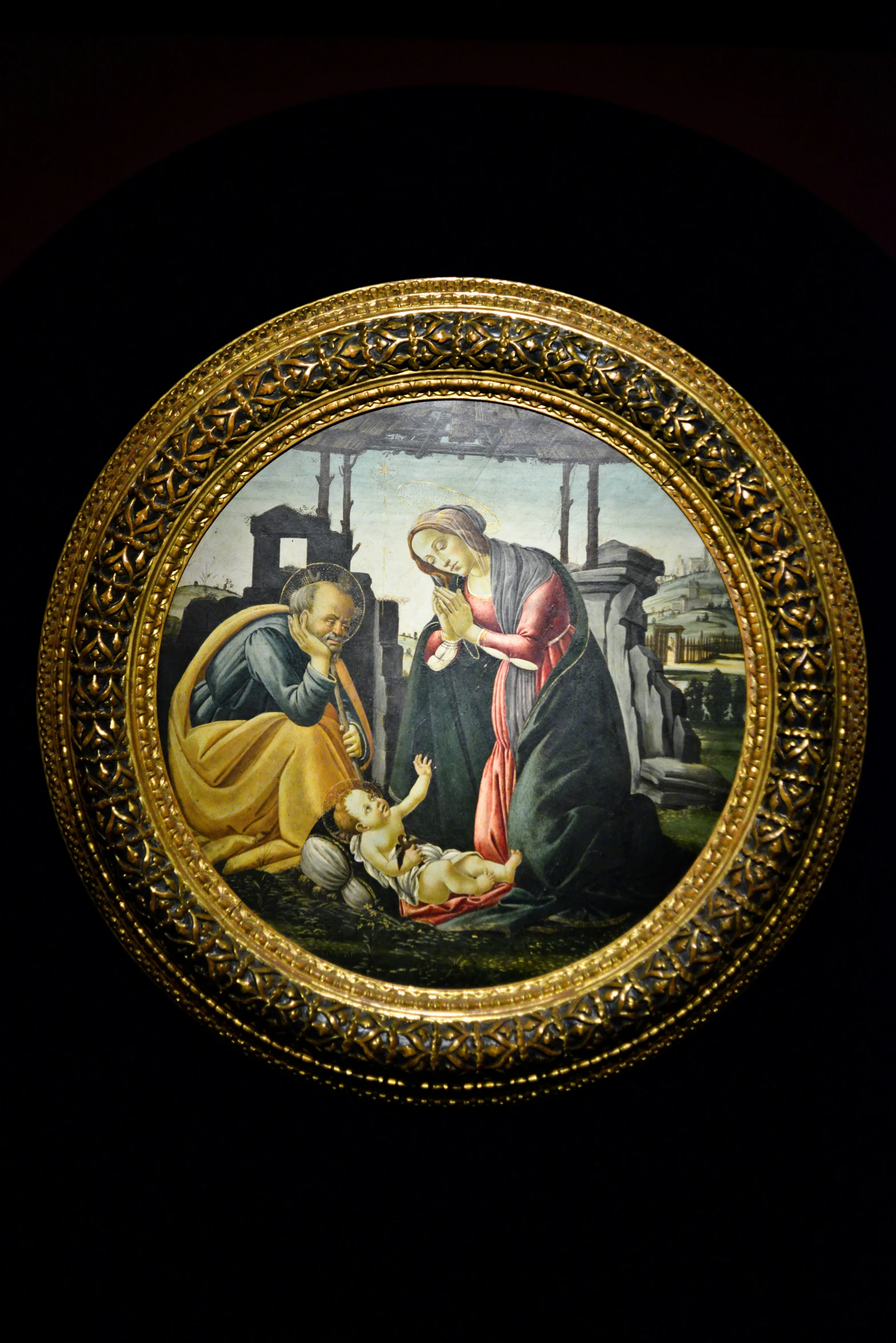 painting on the wall of a building featuring a nativity scene