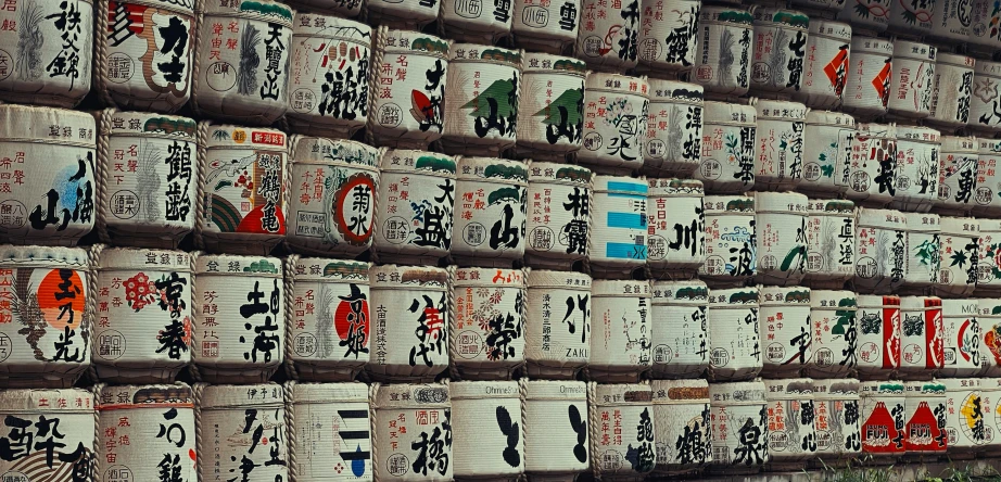 multiple stacks of wall hangings with chinese characters