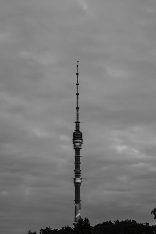 the sky tower is on a cloudy day