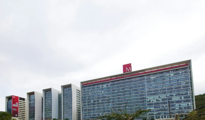 a building and a group of other buildings sitting next to each other