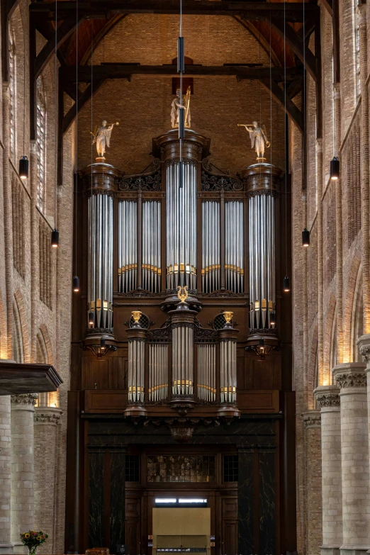 a church with an organ hanging above the altar