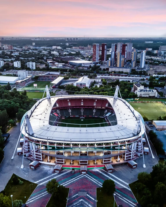 a view of a stadium from the air at dusk