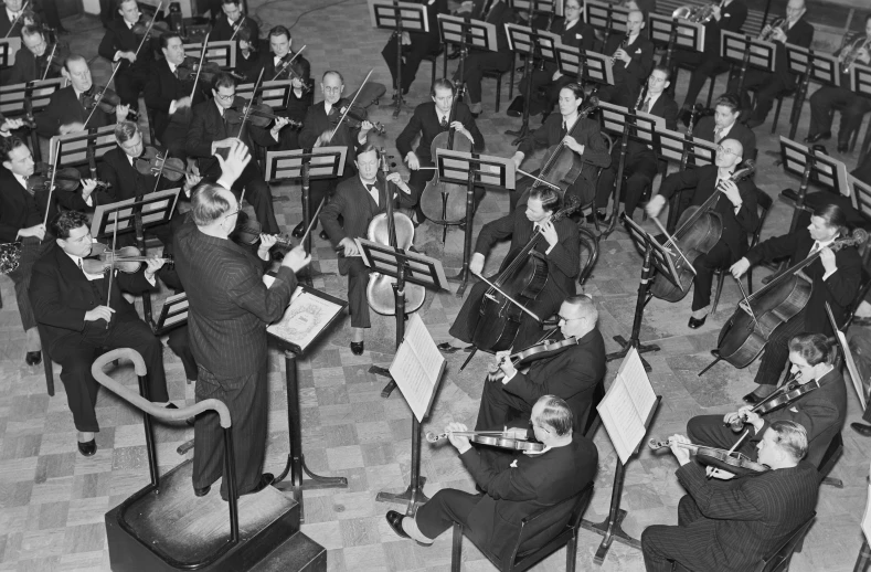 an image of orchestra with music