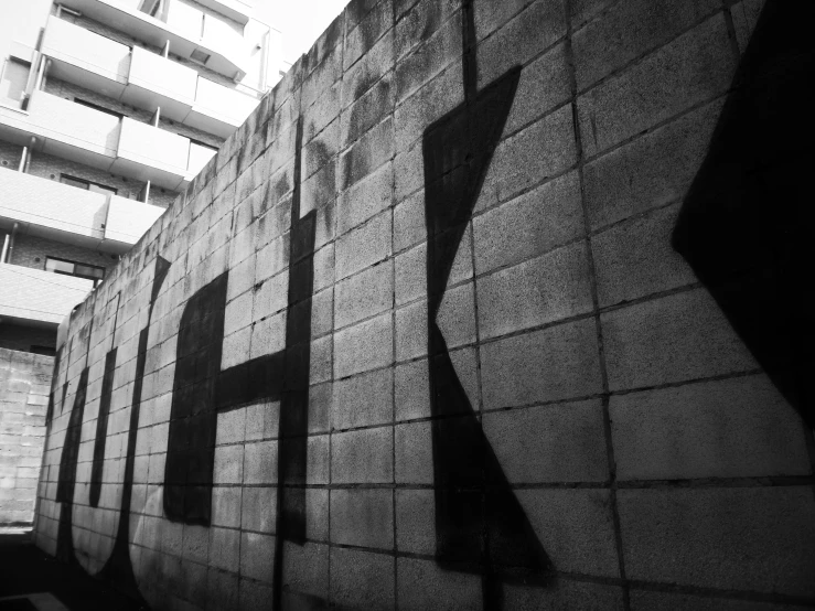 black and white pograph of a building on a city street