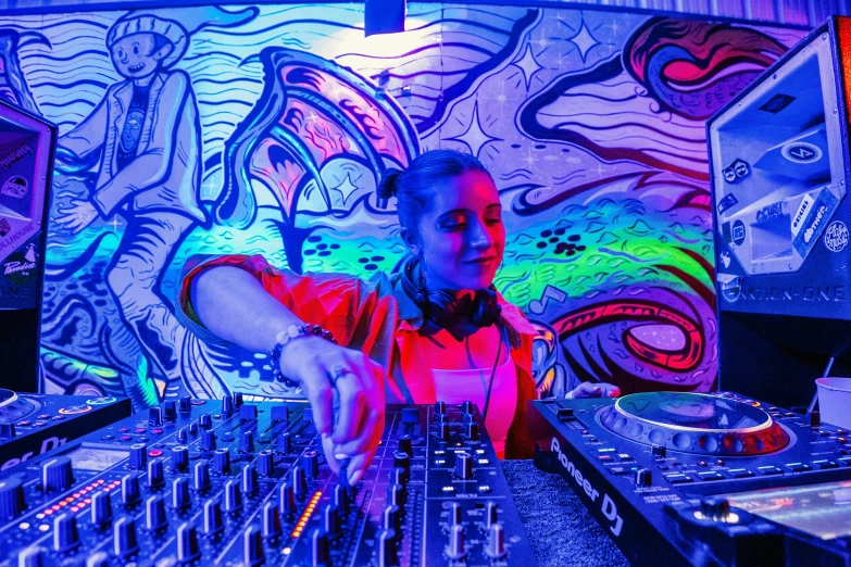 a dj mixing on his set at the party