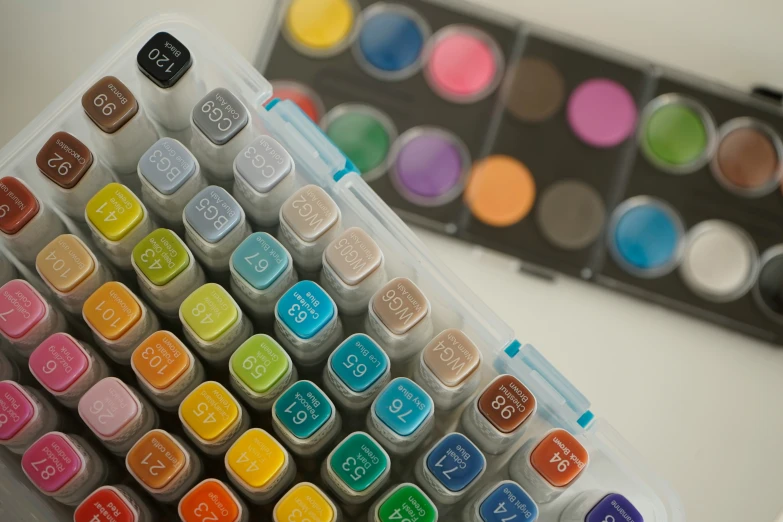 a large set of colorful face powder in a container