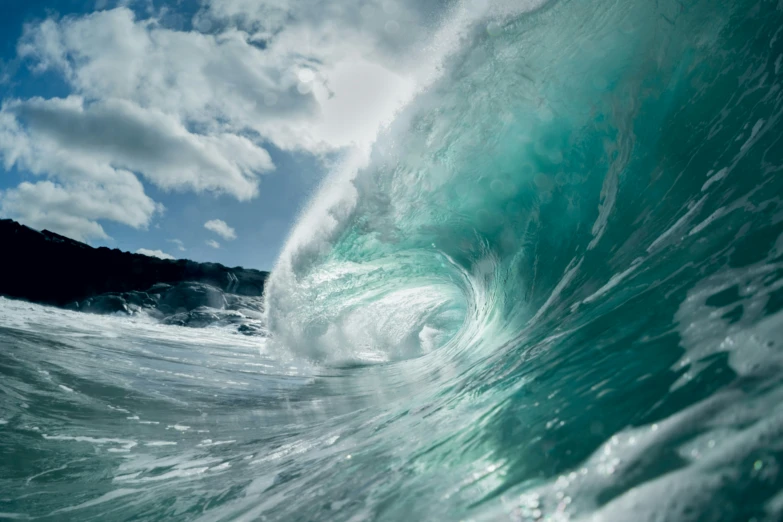 a big wave is coming in to shore