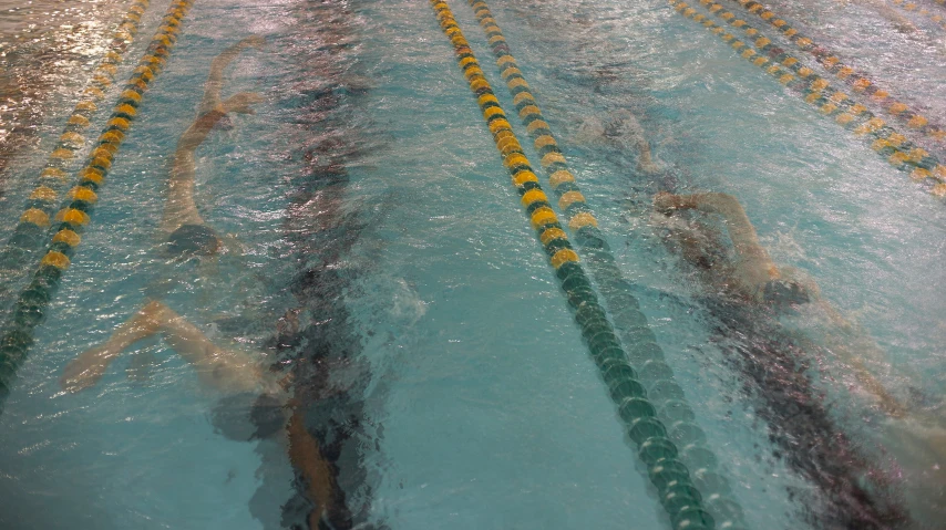 the man is standing next to the diving lanes