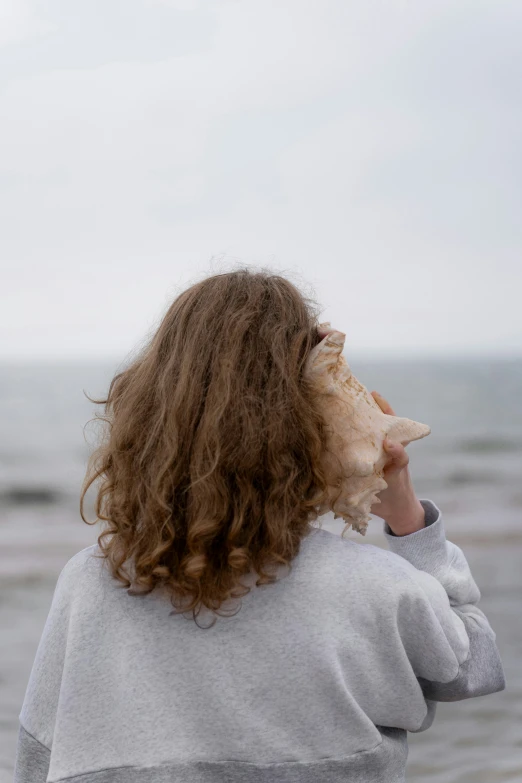 a person is looking out at the water