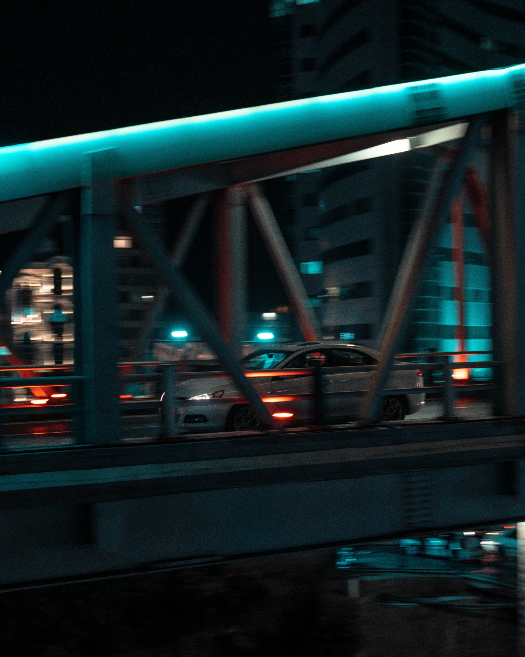 traffic on a bridge at night with street lights