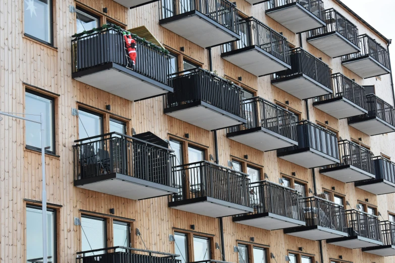 an apartment building with balcony balconies and balconies attached to it