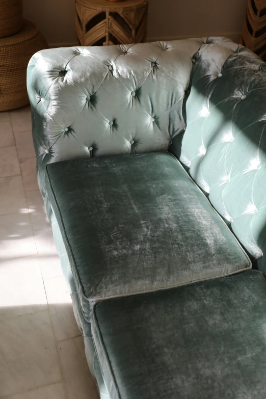 a couch that has some silver on it