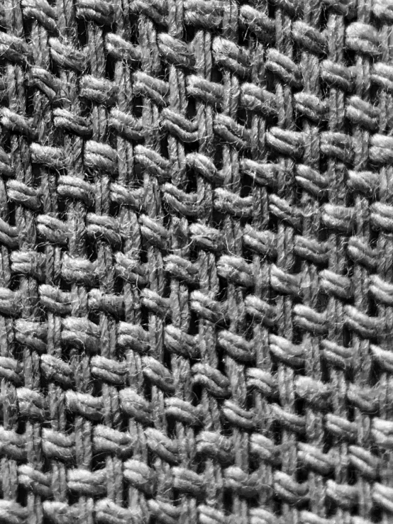 textured fabric in black and white, very detailed background