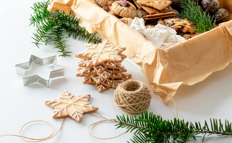 several christmas decorations including cookies, cookies and pine nches