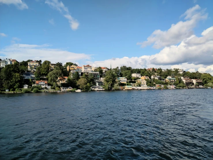 a body of water with some houses on it