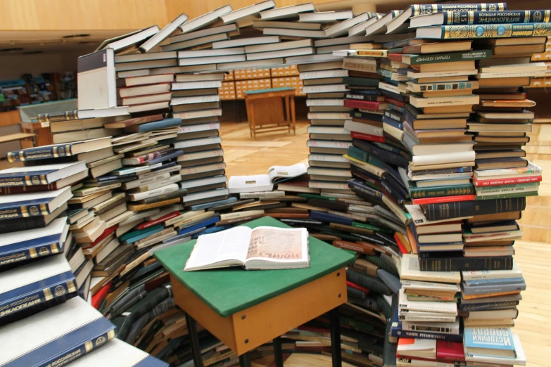 stacks of books in an open air liry