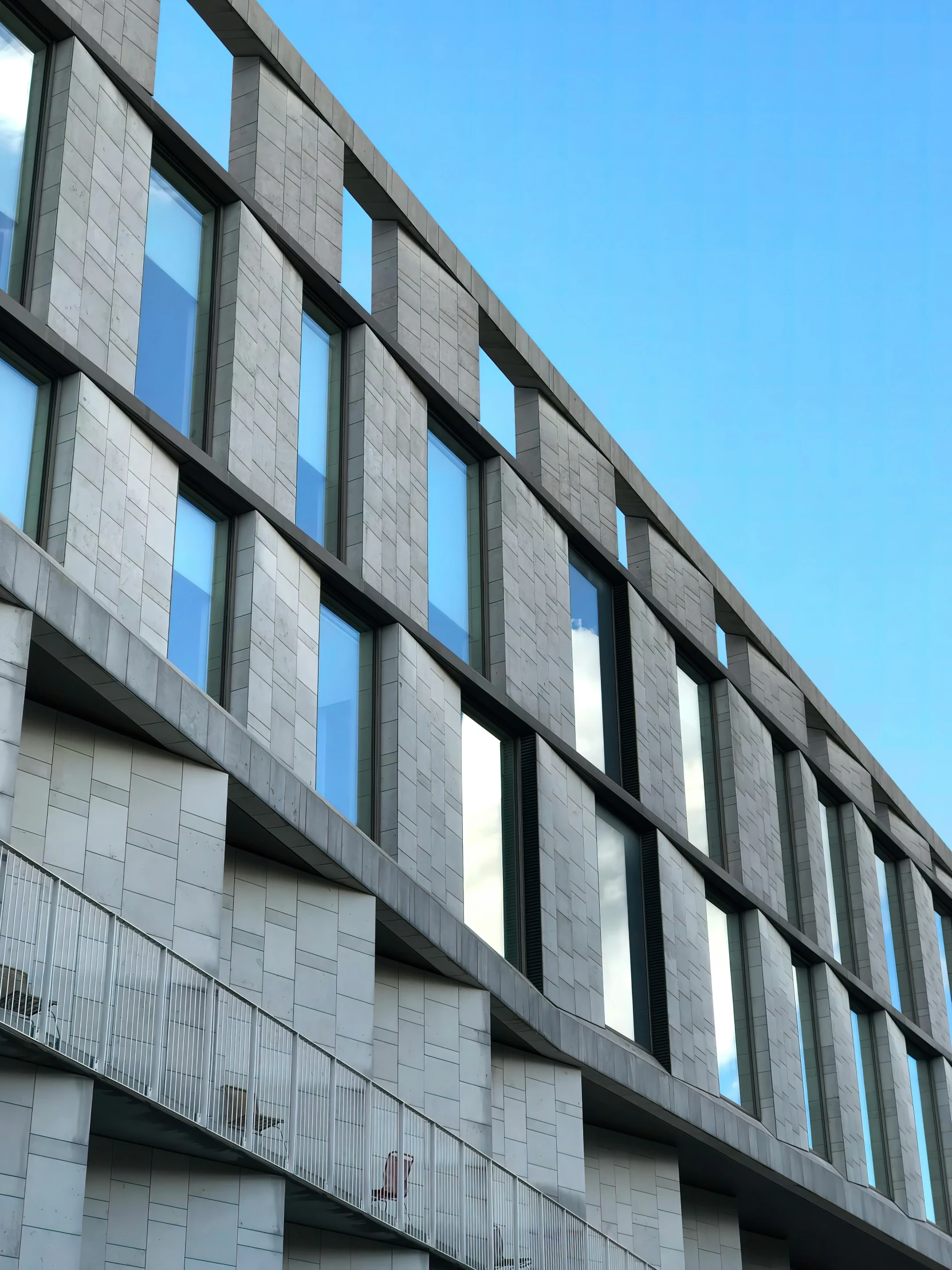 the facade of a building with many windows